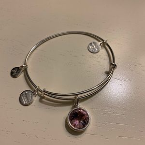 Silver Alex and Ani bangle with pink stone